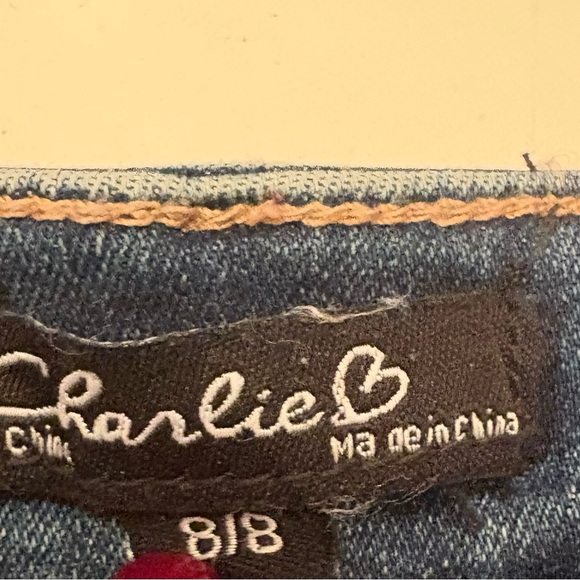 CHARLIE B Distressed Blue Jeans with Pom Pom Accents - Picture 3 of 7